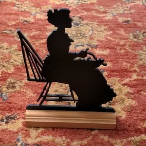 Like new wooden silhouette of vintage lady